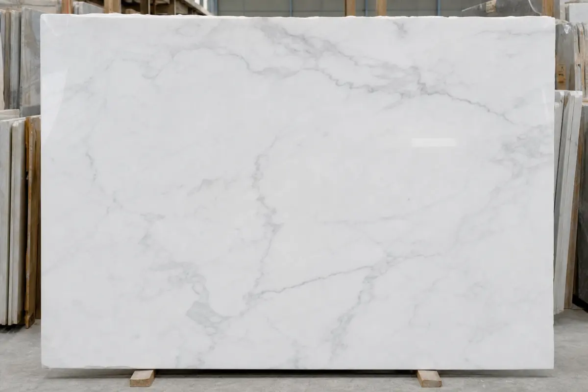 Polished white marble sample used for visual stone matching